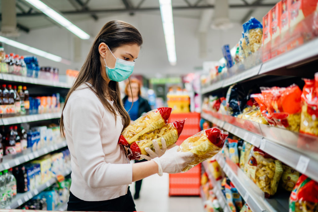 Buyer wearing a protective mask.Shopping during the pandemic qua