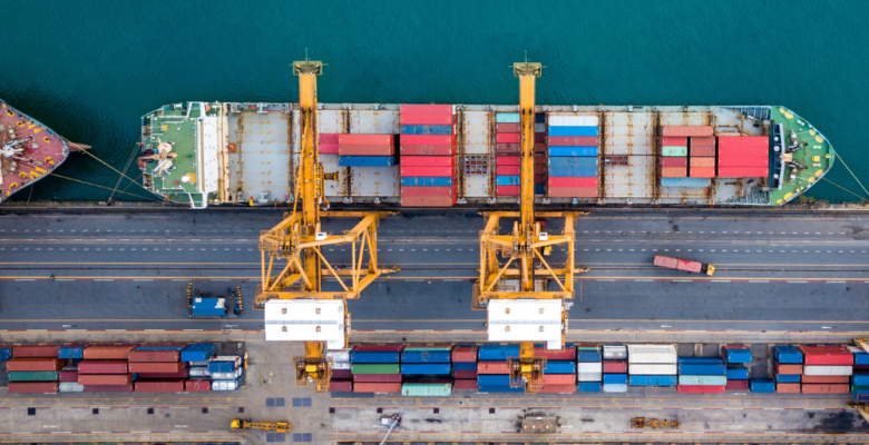 Aerial Shot of a Cargo Ship and Cargo Boxes